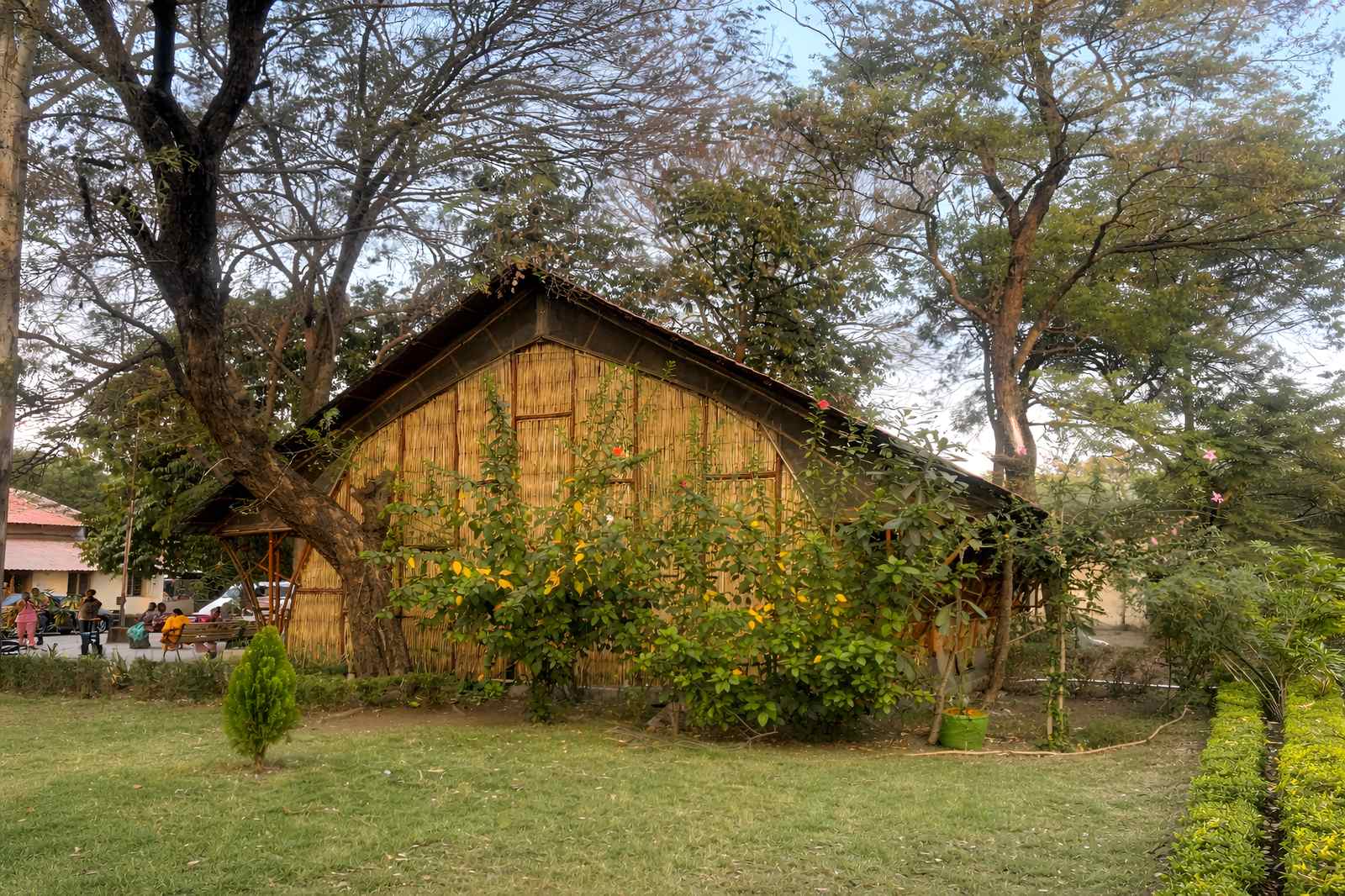 Community Space — side view showing bamboo roof and open verandah