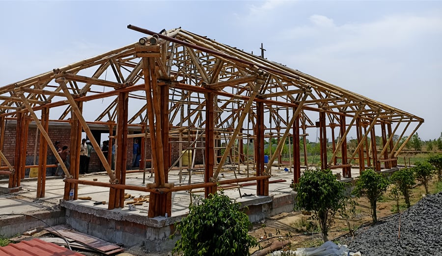 Multiple trusses installed — long-span roof system taking form